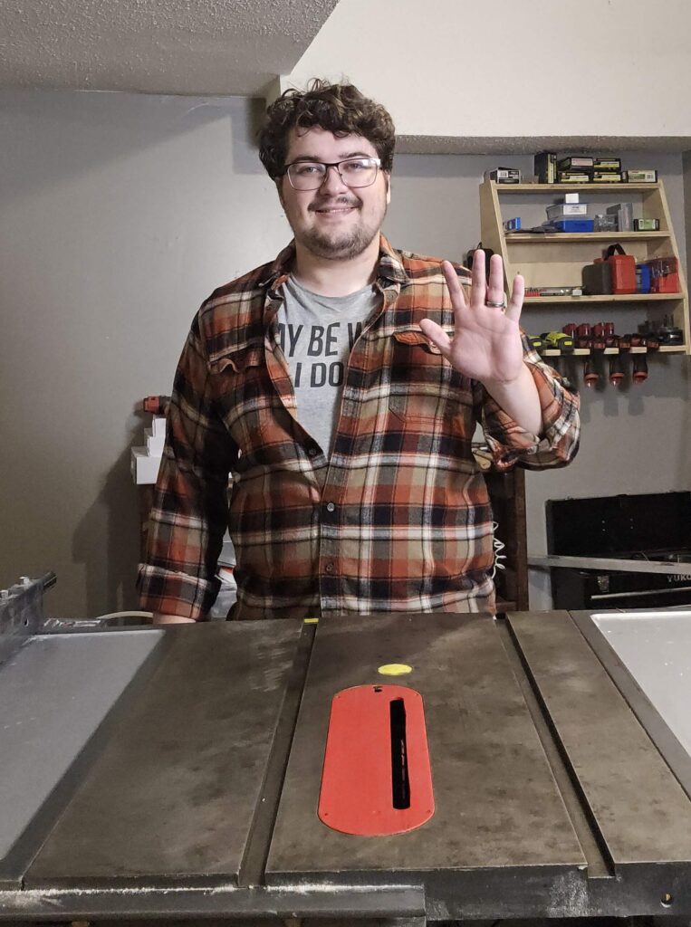 Founder waving at camera