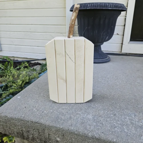 Medium White Jack-O-Lantern made from 2x4 and a natural branch as stem.